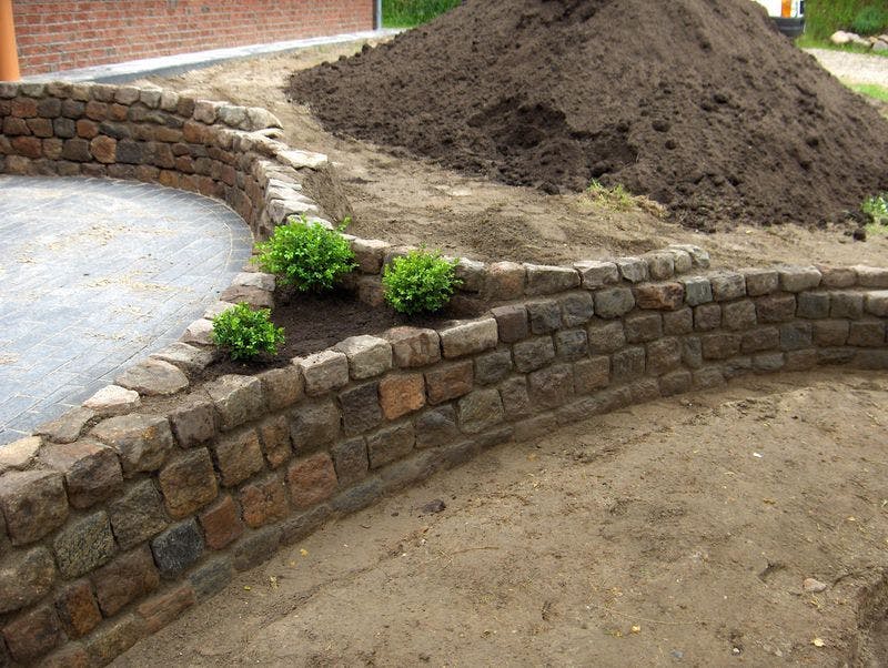 Terrace with fieldstone wall