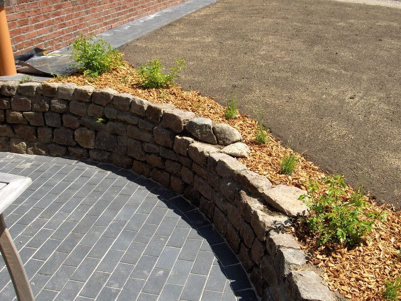 Terrace with fieldstone wall