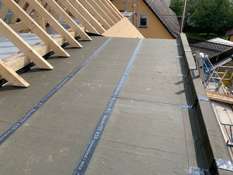 Waterproofing with roofing felt, liquid plastic, and film