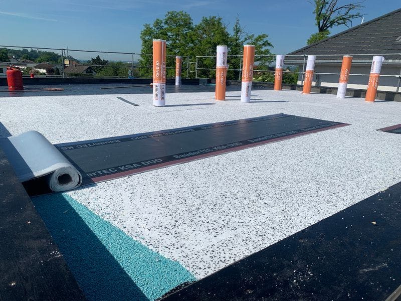 Waterproofing with roofing felt, liquid plastic, and film